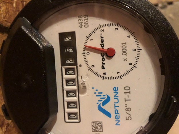 An electrical meter shows a reading