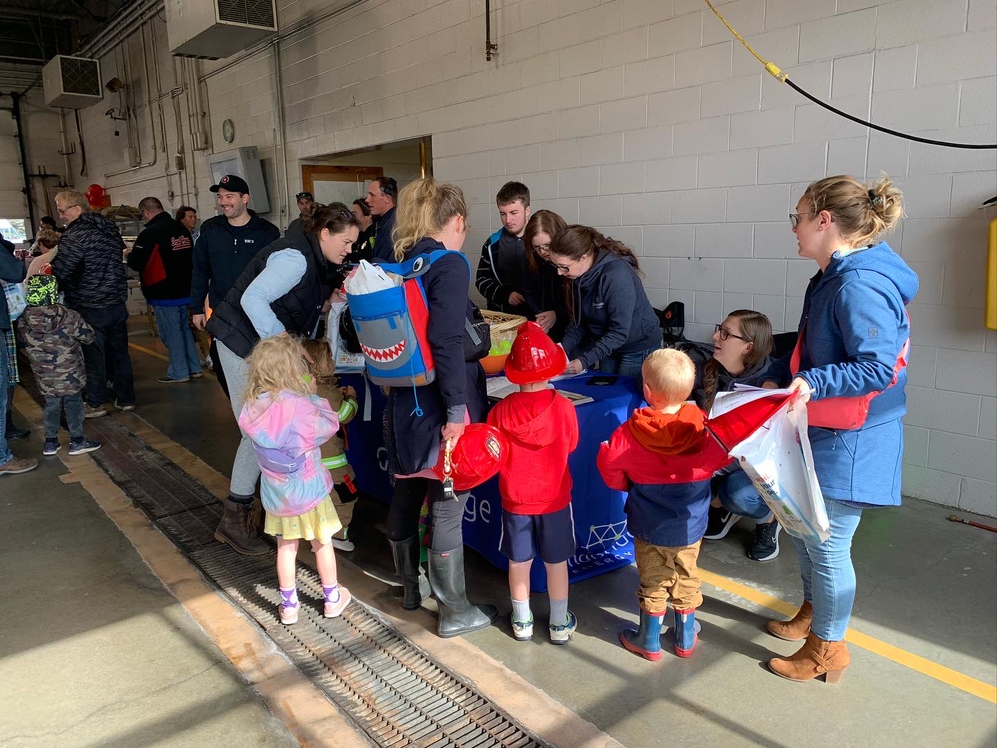 GrandBridge Energy talks to kids and their families at Fire Prevention Week's open house.