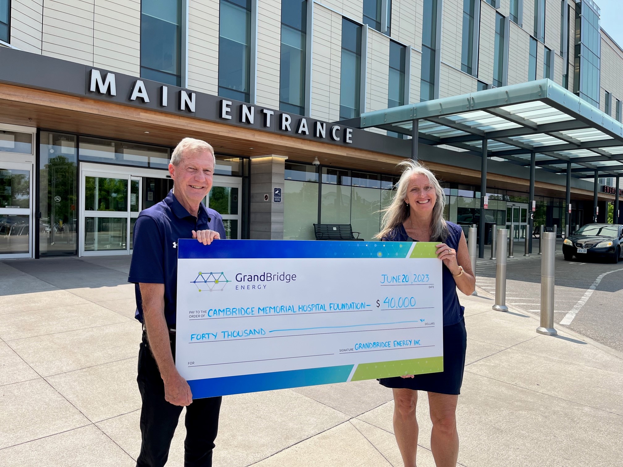 The GrandBridge Energy team makes a donation to the Cambridge Memorial Hospital Foundation.