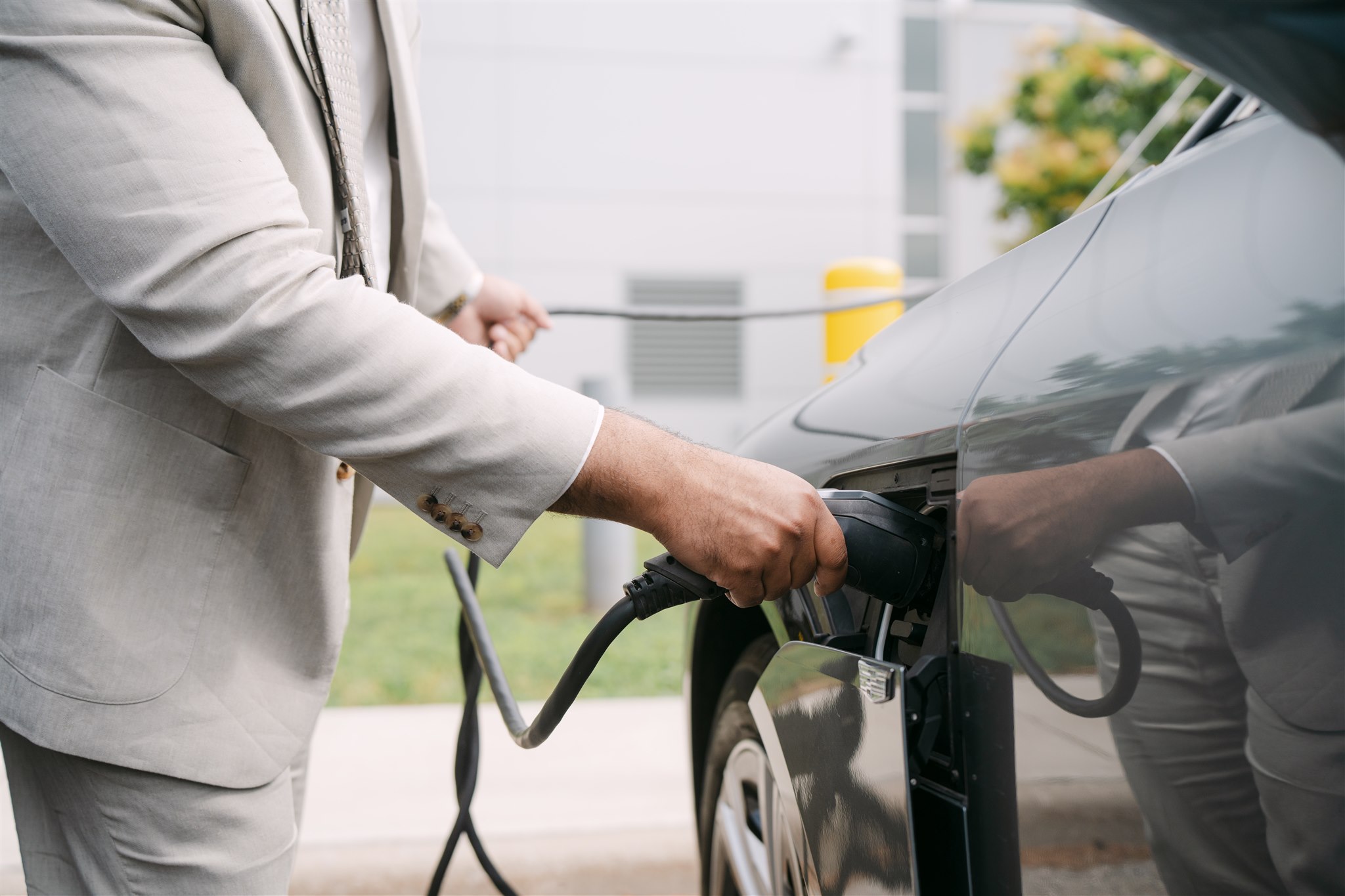 Man charging his Electric Vehicle