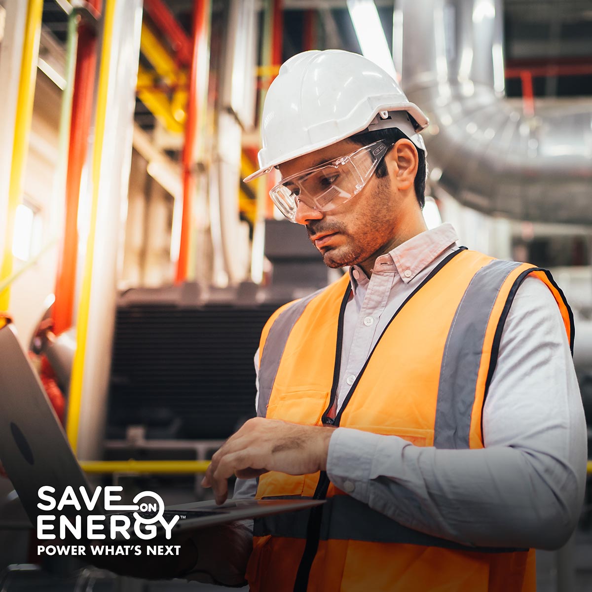 Man investigates potential energy savings in a factory.